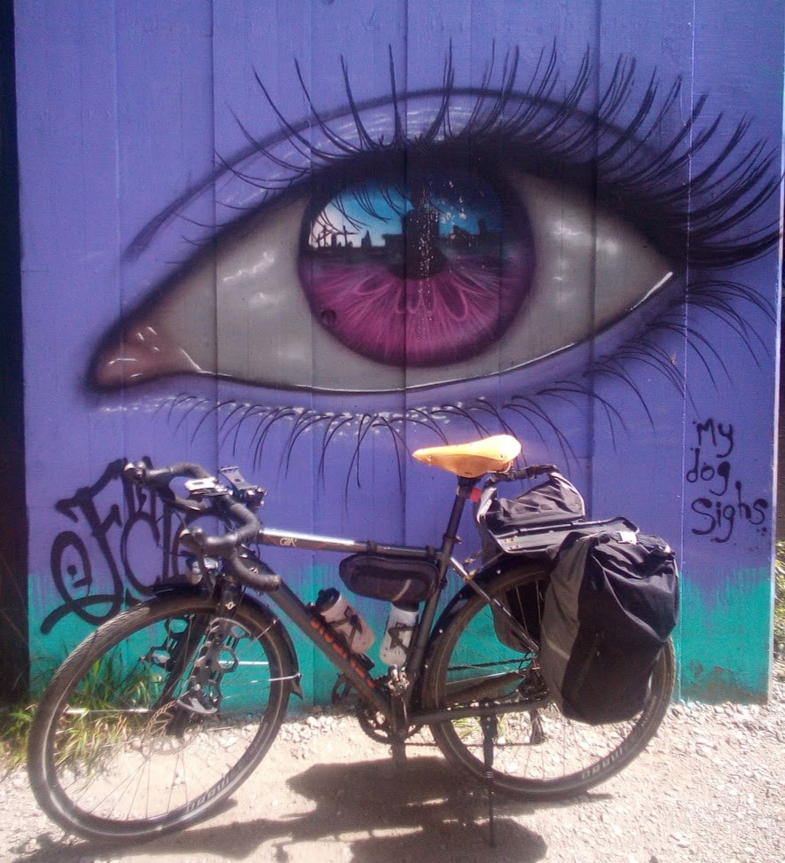 Graffiti my an artist called My Dog Sighs. Oh, and a damn nice bike, too :-)